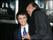 Ralph Fiennes (Lord Voldemort) takes aim at Daniel Radcliffe (Harry Potter) at the Nov. 12, 2005, premiere of 'Harry Potter and the Goblet of Fire.'