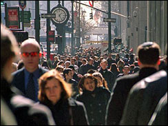 People walk the crowded streets of New York City
