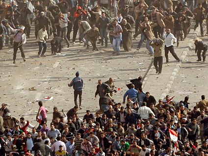 Mubarak Supporters, Foes Clash in Tahrir Square