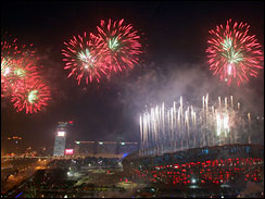 Fireworks explode over the National Stadium, known as the Bird's Nest, during the opening ceremony (AP)
